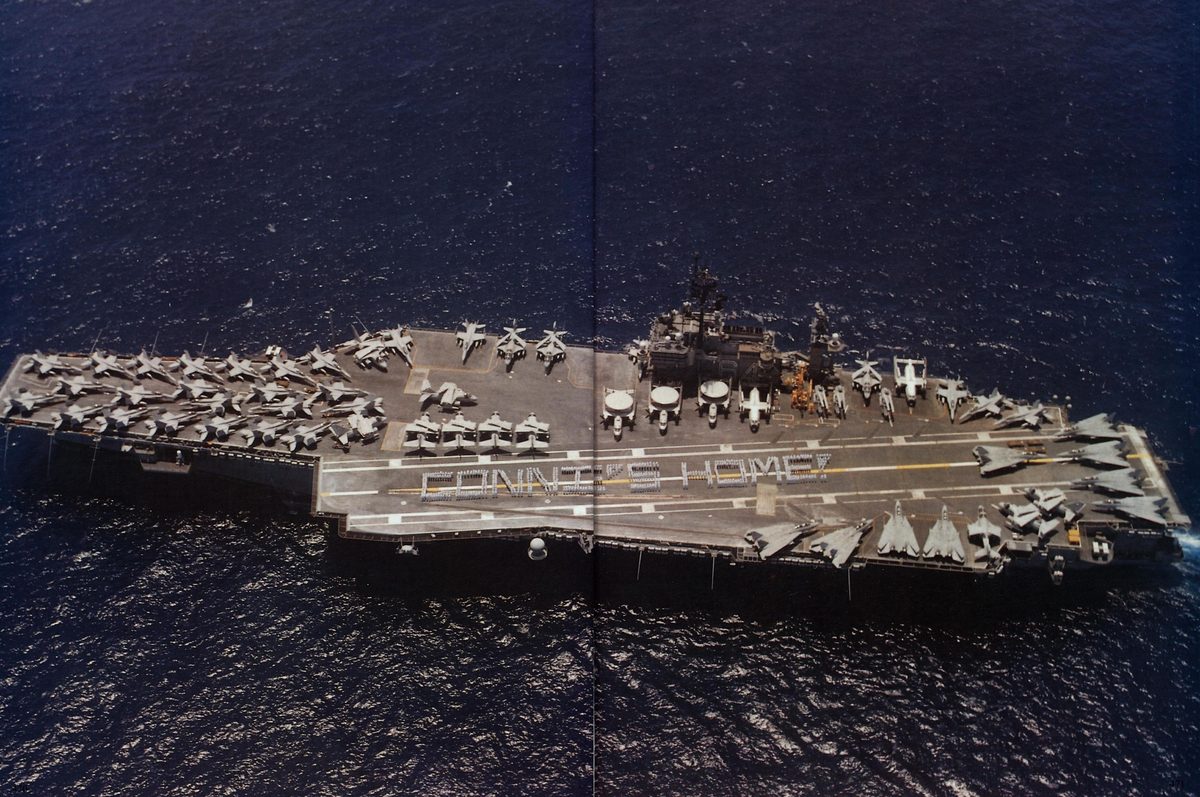 USS Constellation 1994–95 cruise book, page 423 — Welcome Home: photographs and page layout, no machine-readable text